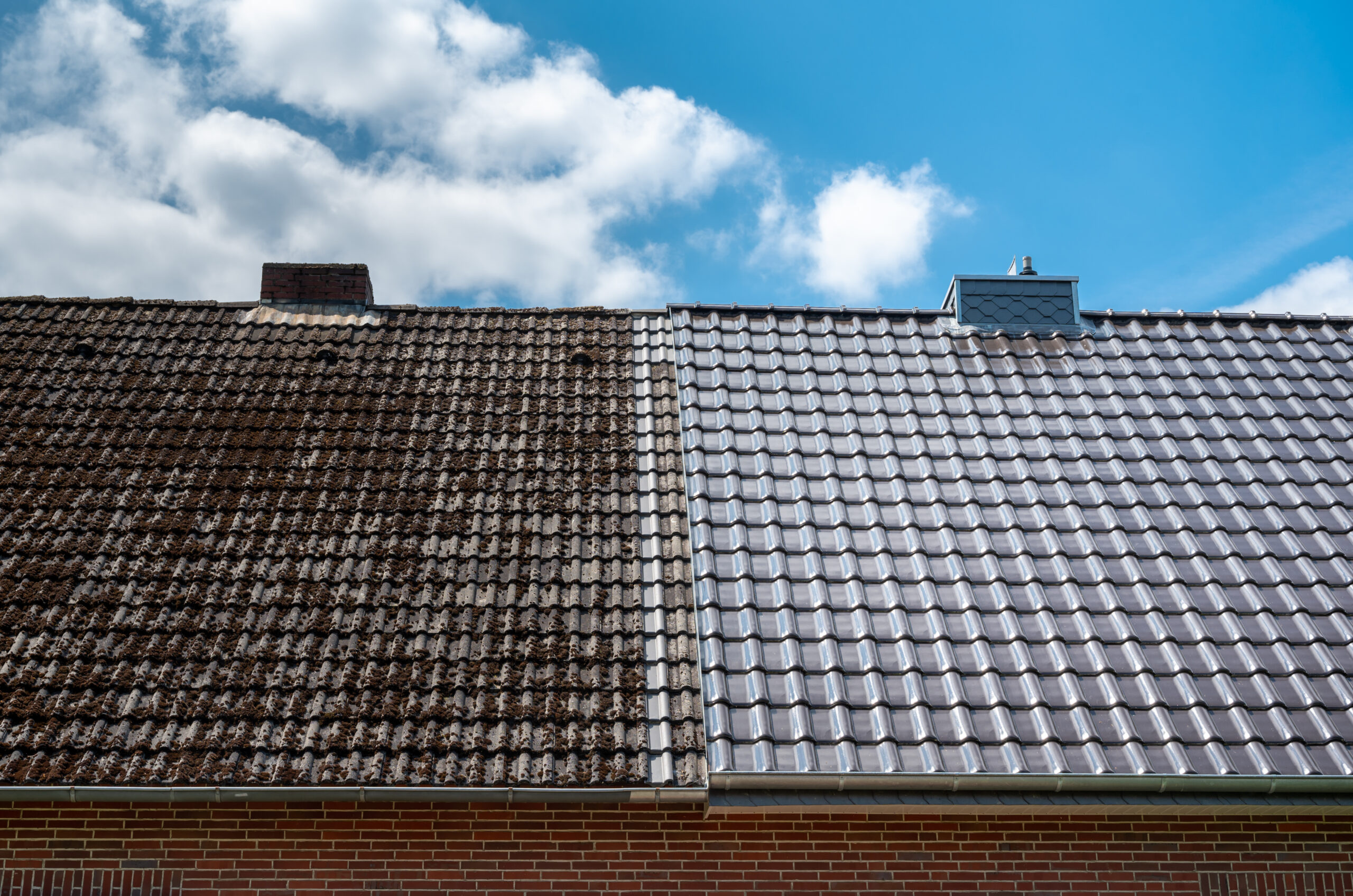 side-by-side comparison of a dirty roof and a clean roof after pressure washing